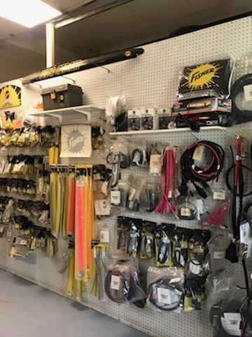 Fisher blade guides, wiring harnesses, and electrical parts on display